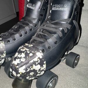 Black impala Roller Skates